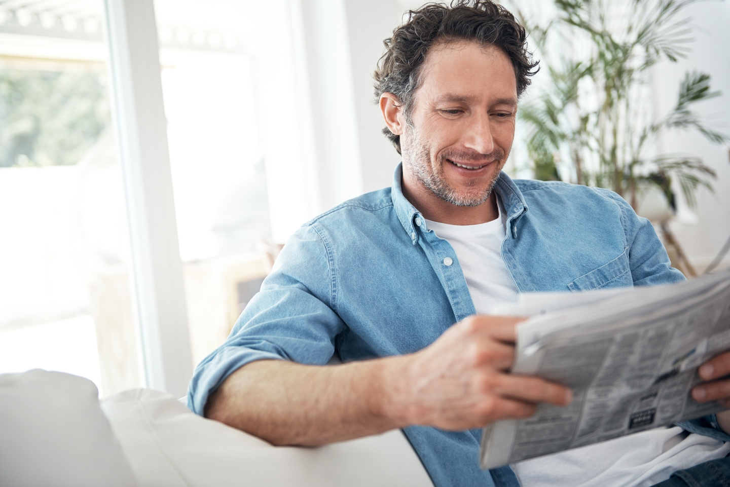 Man reading newspaper