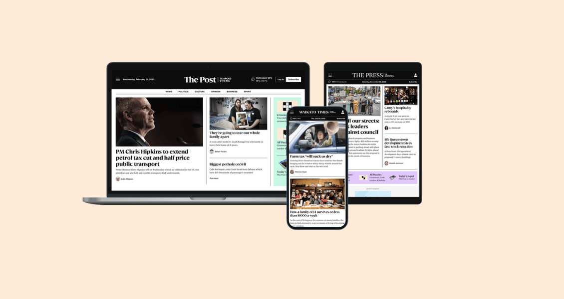 Laptop, Phone and laptop with Digital News loaded on the screen